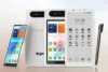 Bigme HiBreak Dual 3 — bílý telefon s e-ink displejem zepředu, zezadu s nasazeným i odepnutým barevným modulem a dotykovým perem vedle