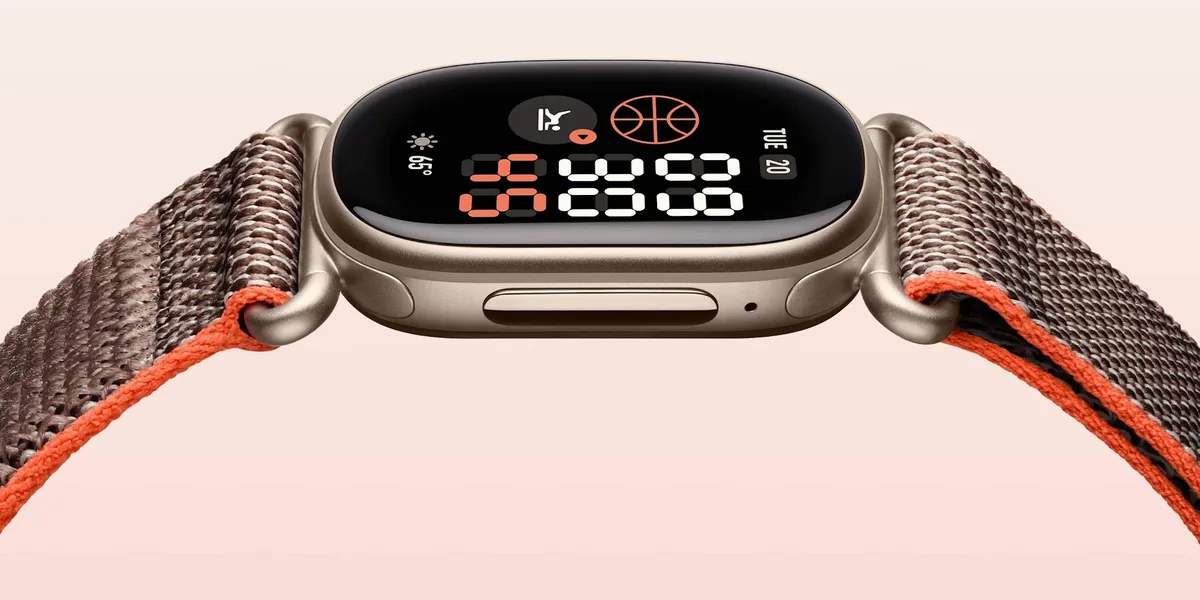 Google Fitbit Edge Stephen Curry Google Fitbit Edge Stephen Curry – boční pohled na pouzdro s tlačítkem a látkovým řemínkem Rye